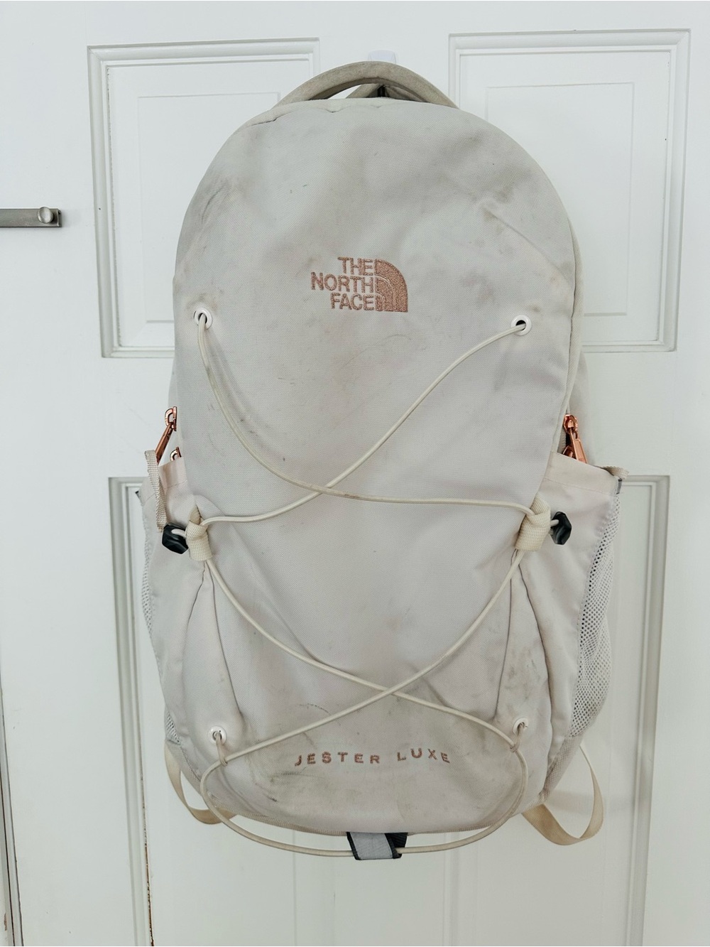 The North Face Jester Luxe Backpack in Cream with Rose Gold Accents